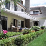 Knikarmschermen en Terrasschermen Knikarmschermen en Terrasschermen